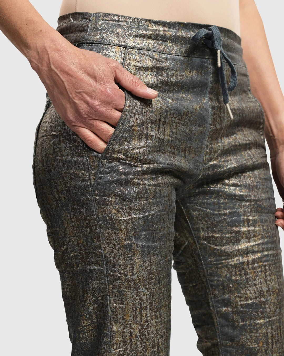 An ALEMBIKA stretch-wearing woman over 50 in Iconic Jeans Desires by Petrol.