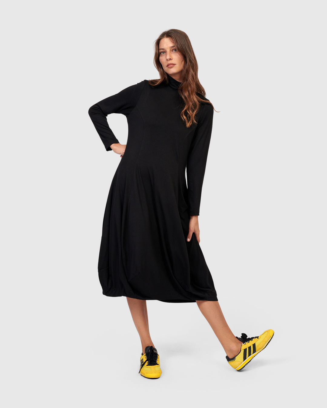 black long sleeve dress turtle neck Norma Kamali Turtleneck Mini Handcrafted from our soft Essential Turtleneck Cocoon Dress, Black